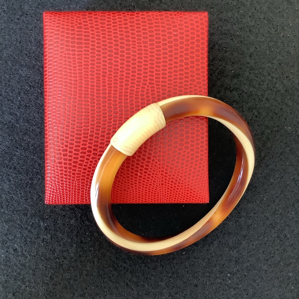 Vintage lea stein paris knot bangle.